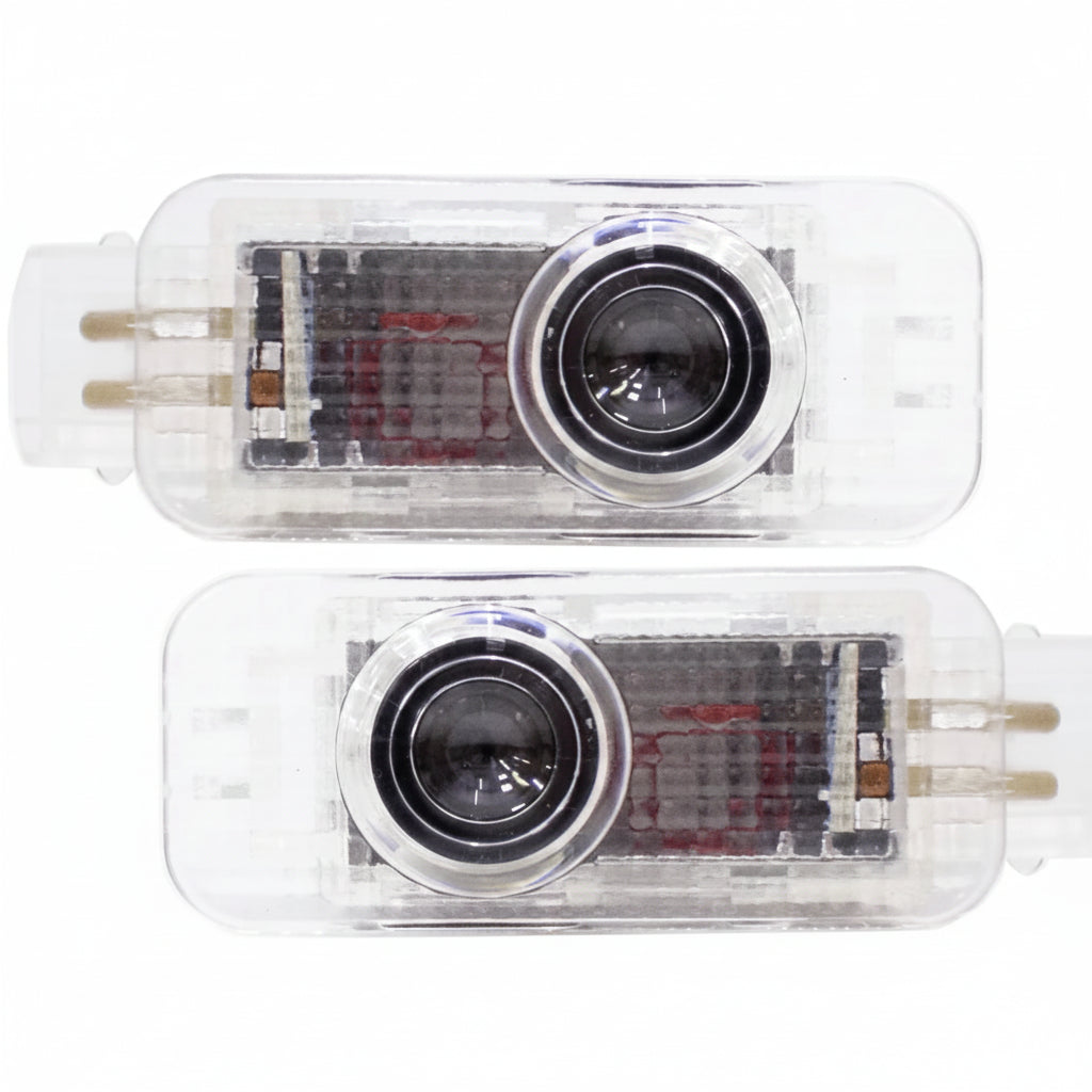 Two transparent camera modules with lenses on a white background