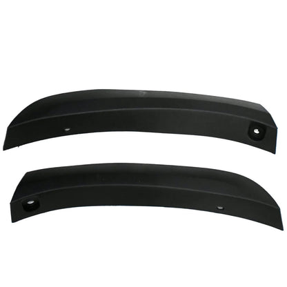Two black car fenders on a white background
