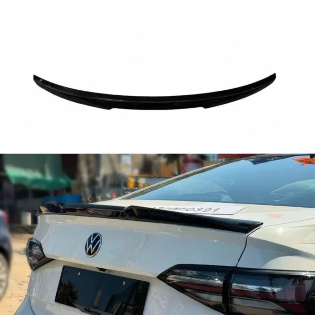 Black car spoiler on a white background with a blurred car in the foreground