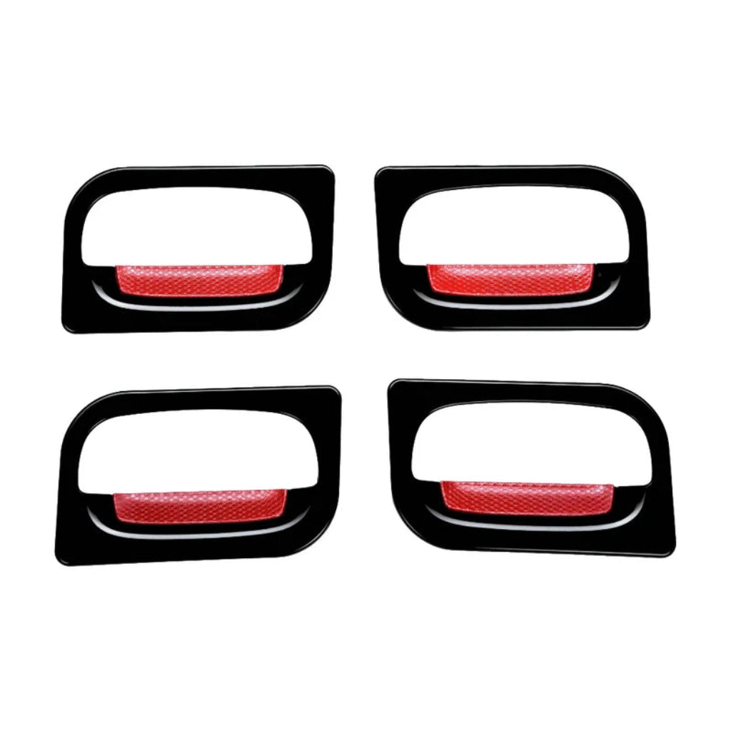 a pair of hybrid black catch covers for Alto K10 on a white background. 