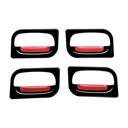 a pair of hybrid black catch covers for Alto K10 on a white background. 