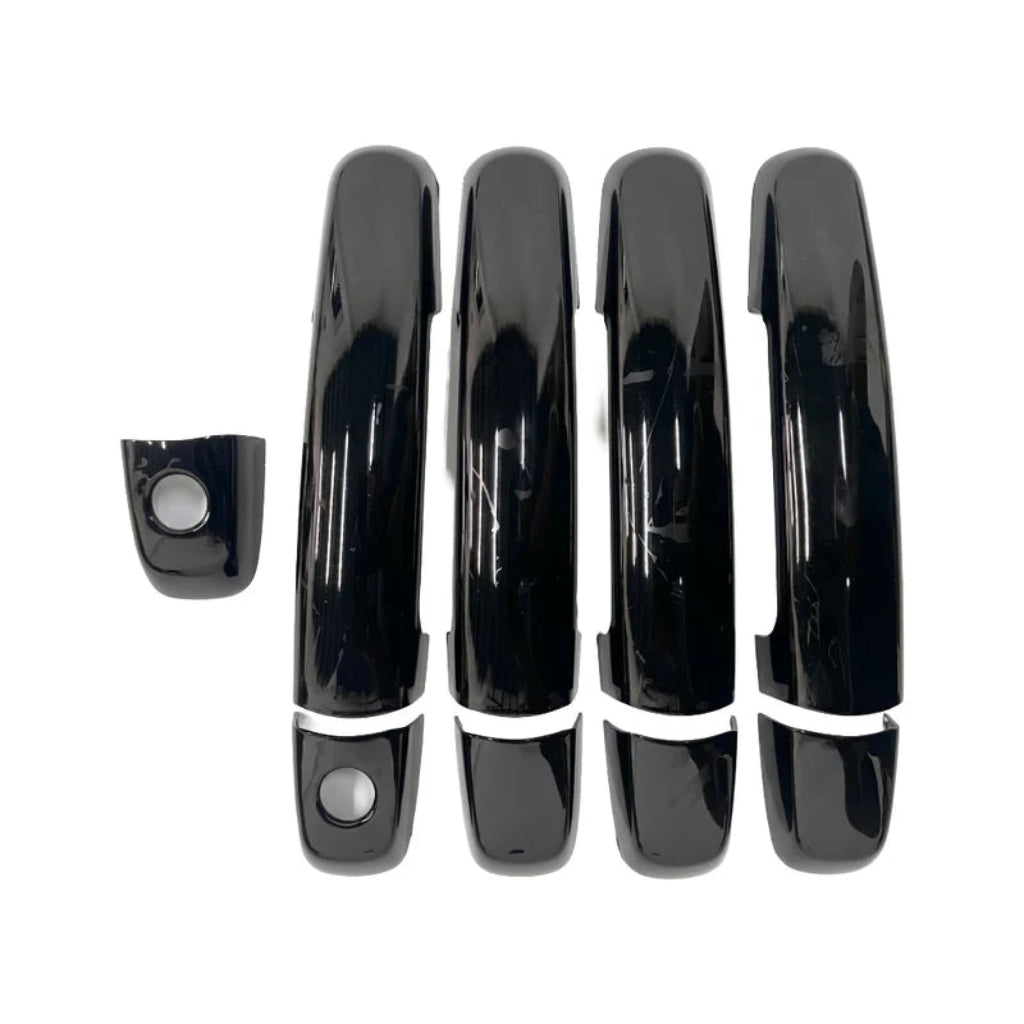 St of 4 Black door handle cover for celerio placed on a white background.