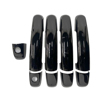 St of 4 Black door handle cover for celerio placed on a white background.