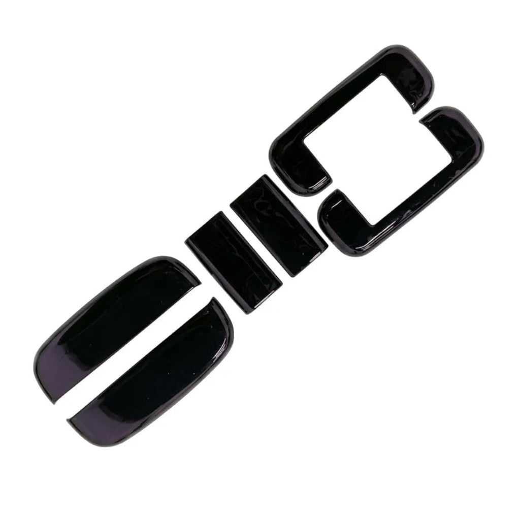 A set of black car door handle covers for Eeco on a white background.