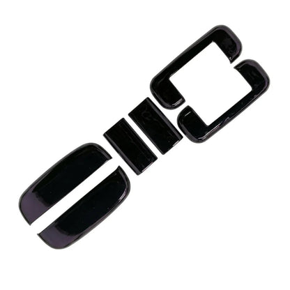 A set of black car door handle covers for Eeco on a white background.