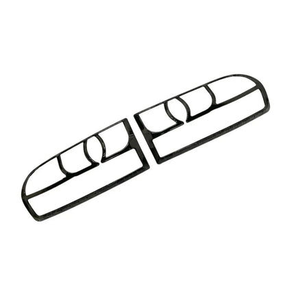 A pair of black taillight covers for Eeco, shown on a white background. 
