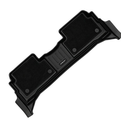 A black molded car floor mat shown diagonally on a plain white background, with a small visible 'SIPL' logo on the centre section.