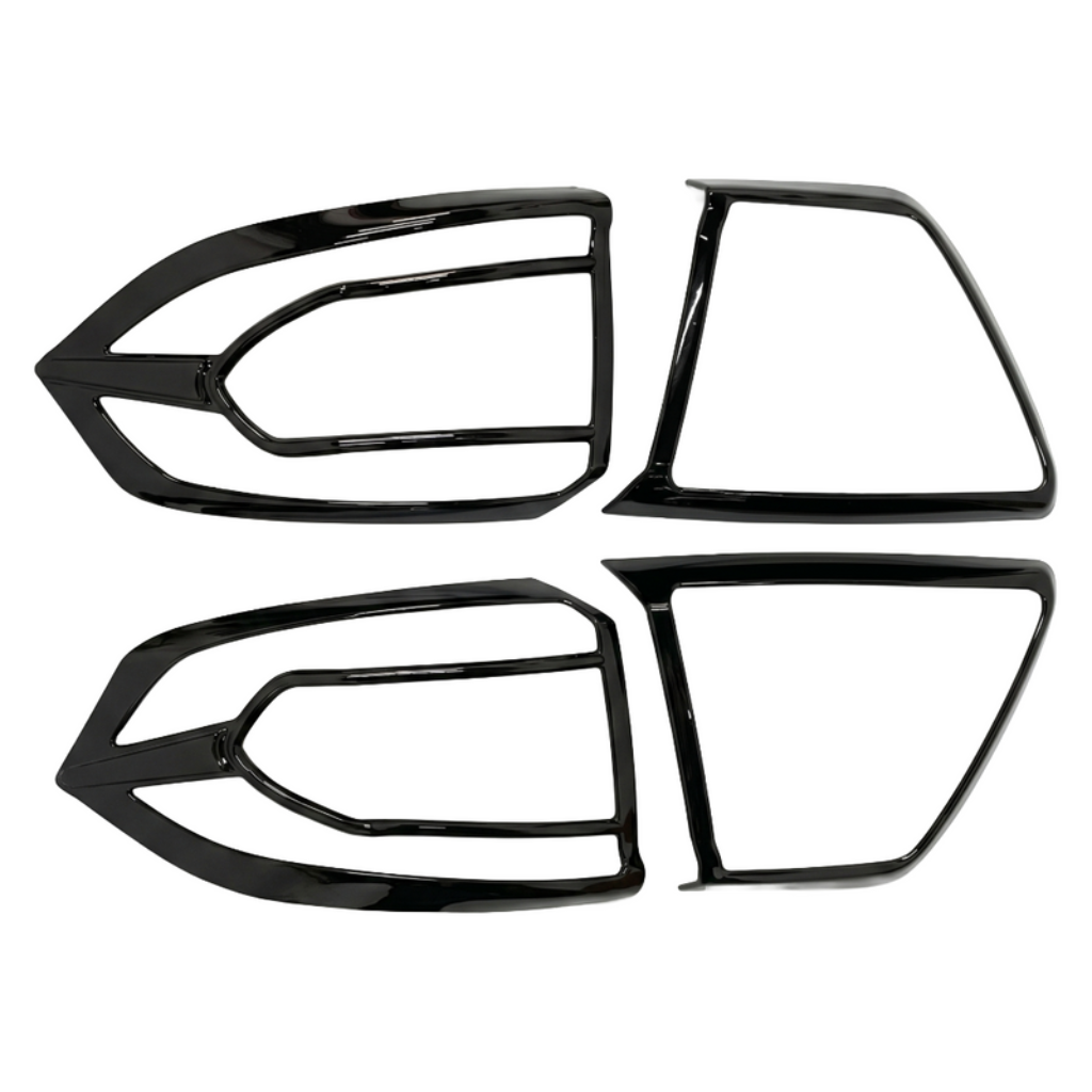 Set of 4 pcs black taillight covers for Tigor, displayed on a white background. 