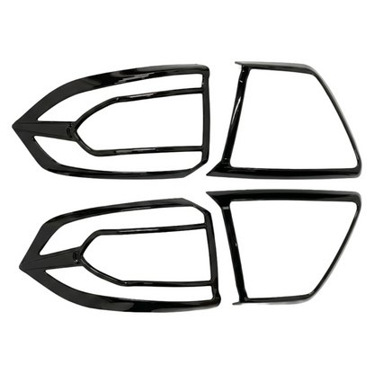 Set of 4 pcs black taillight covers for Tigor, displayed on a white background. 