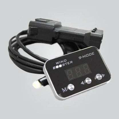 A black electronic wind and booster control module with a digital LED display and three silver buttons, shown with attached wiring and connector on a light gray background.
